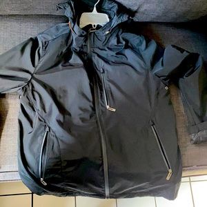 Two windbreakers, black and a brownish-green.